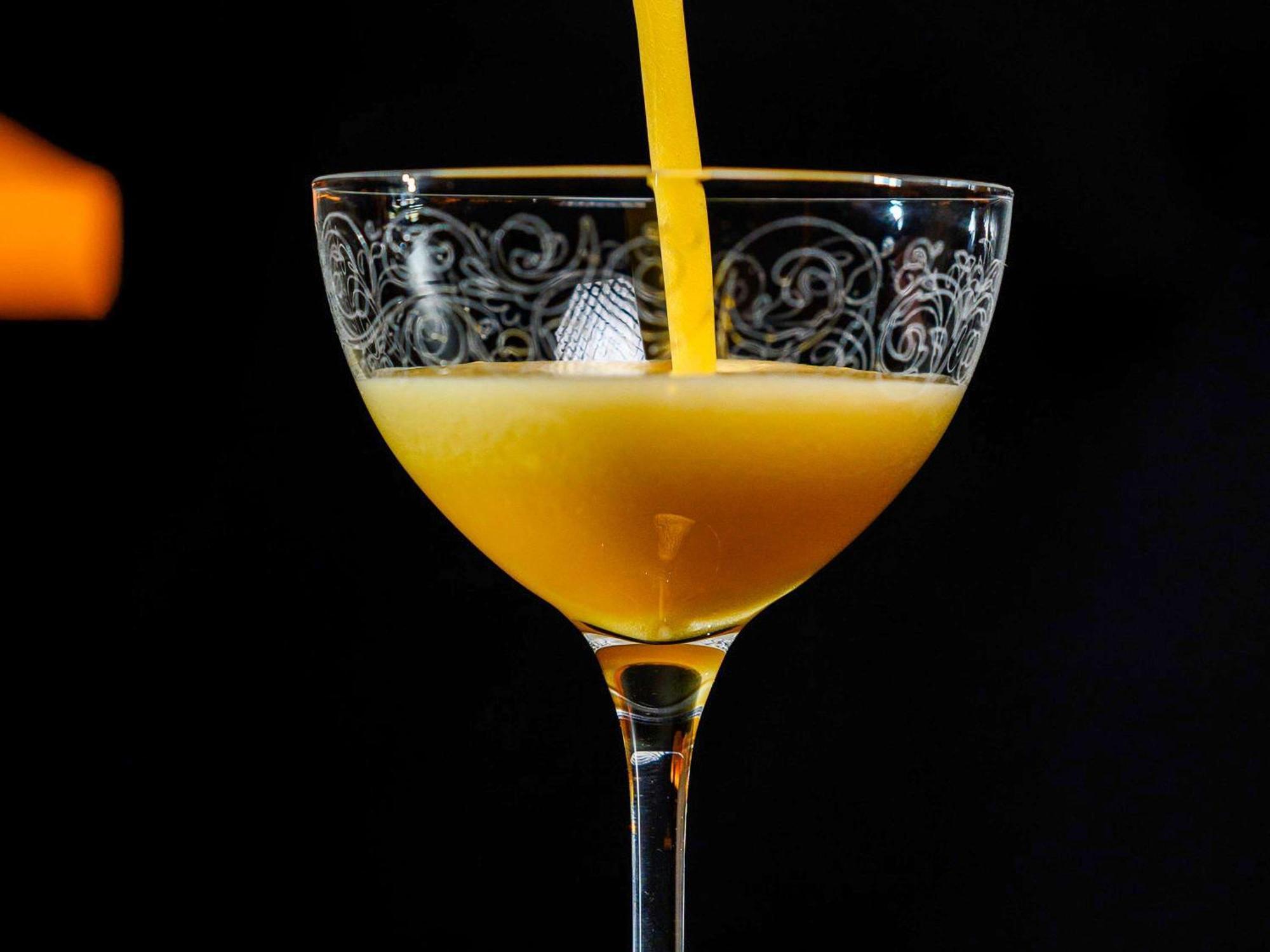Pullman Riga Old Town Hotel Bagian luar foto A glass of orange juice